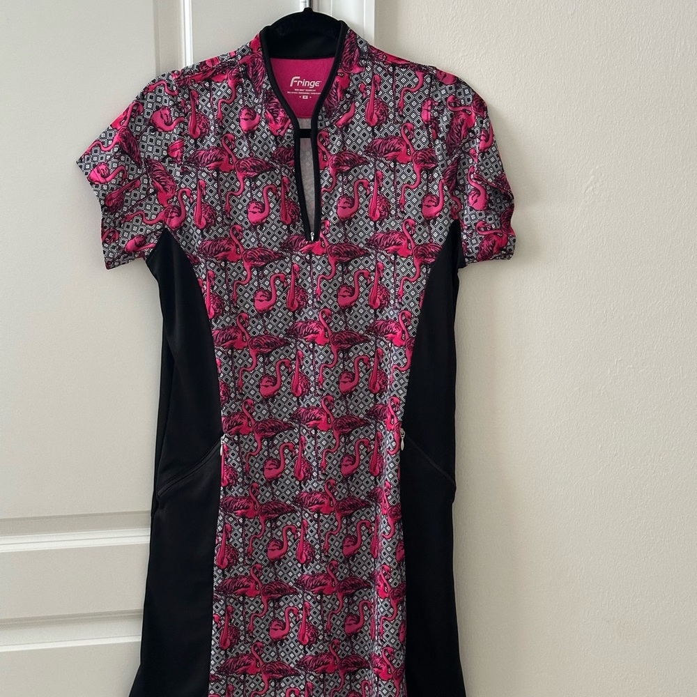 Women’s Golf Dress like new size M
Brand Fringe black with Flamingo design
